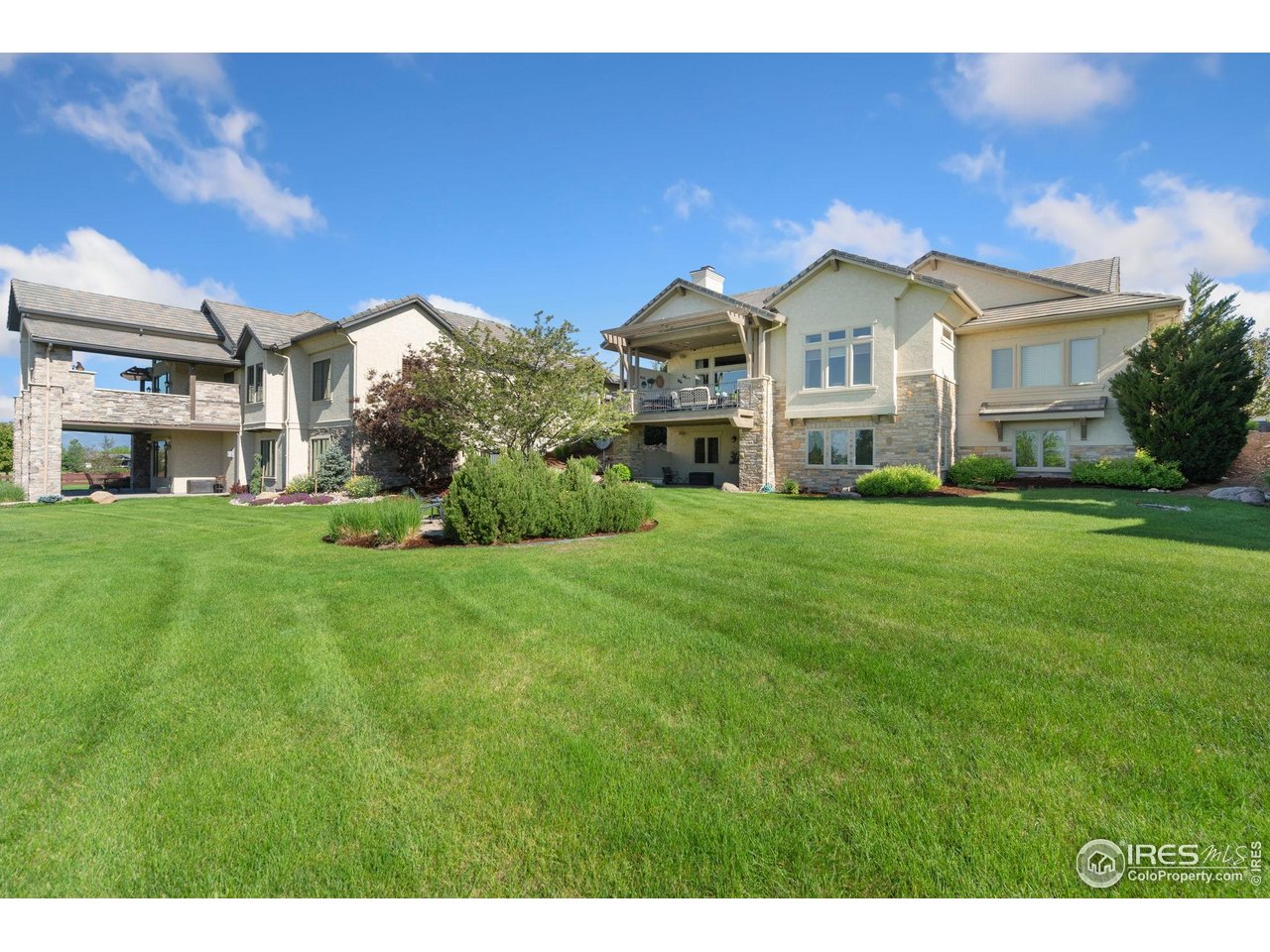 6701 Clovis Court Timnath, CO 80547 - Photo 27 of 40 a view of house with garden