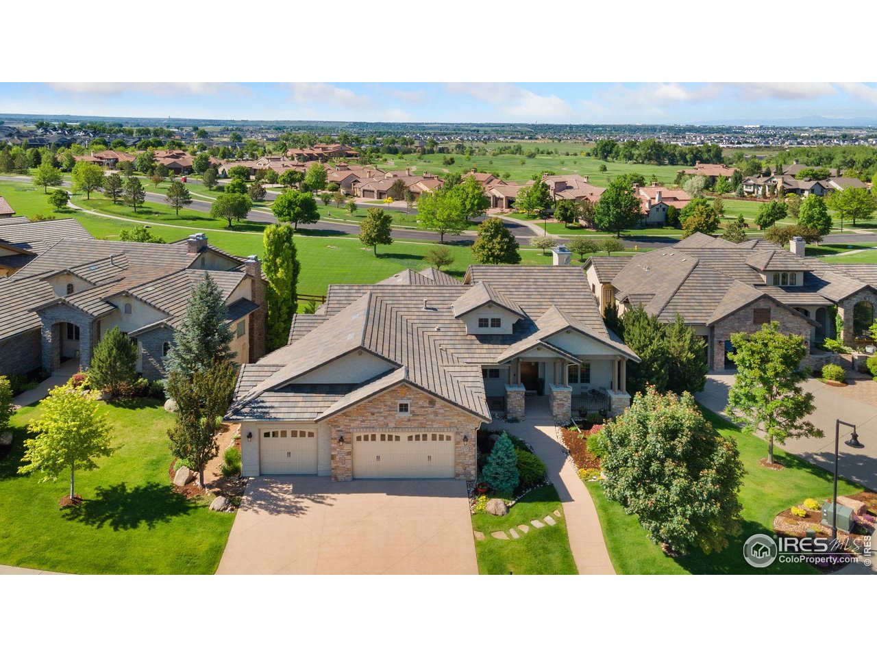 6701 Clovis Court Timnath, CO 80547 - Photo 32 of 40 an aerial view of a house with a garden