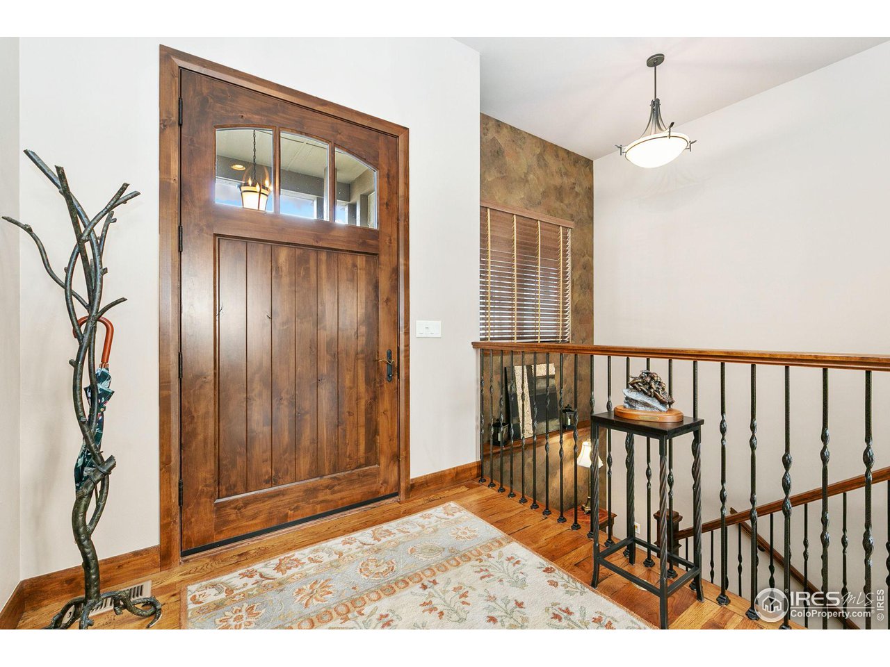 6701 Clovis Court Timnath, CO 80547 - Photo 8 of 40 a view of a porch with a table and chairs