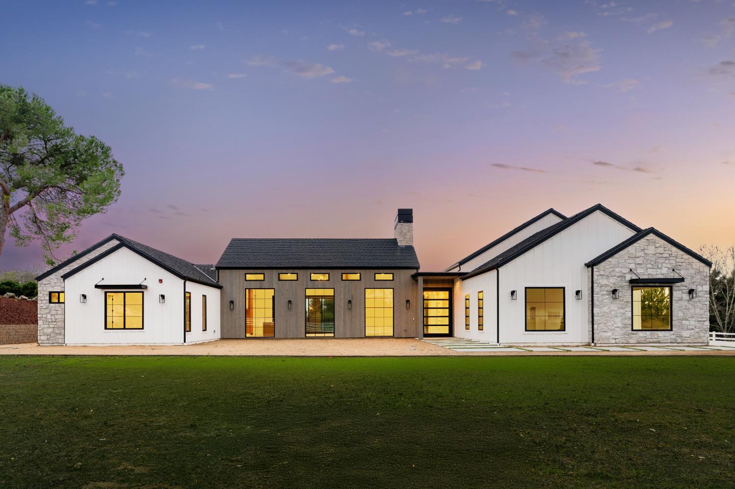6980 High Cliff Road Loomis, CA 95650 - Photo 1 of 1 a front view of a house with a garden
