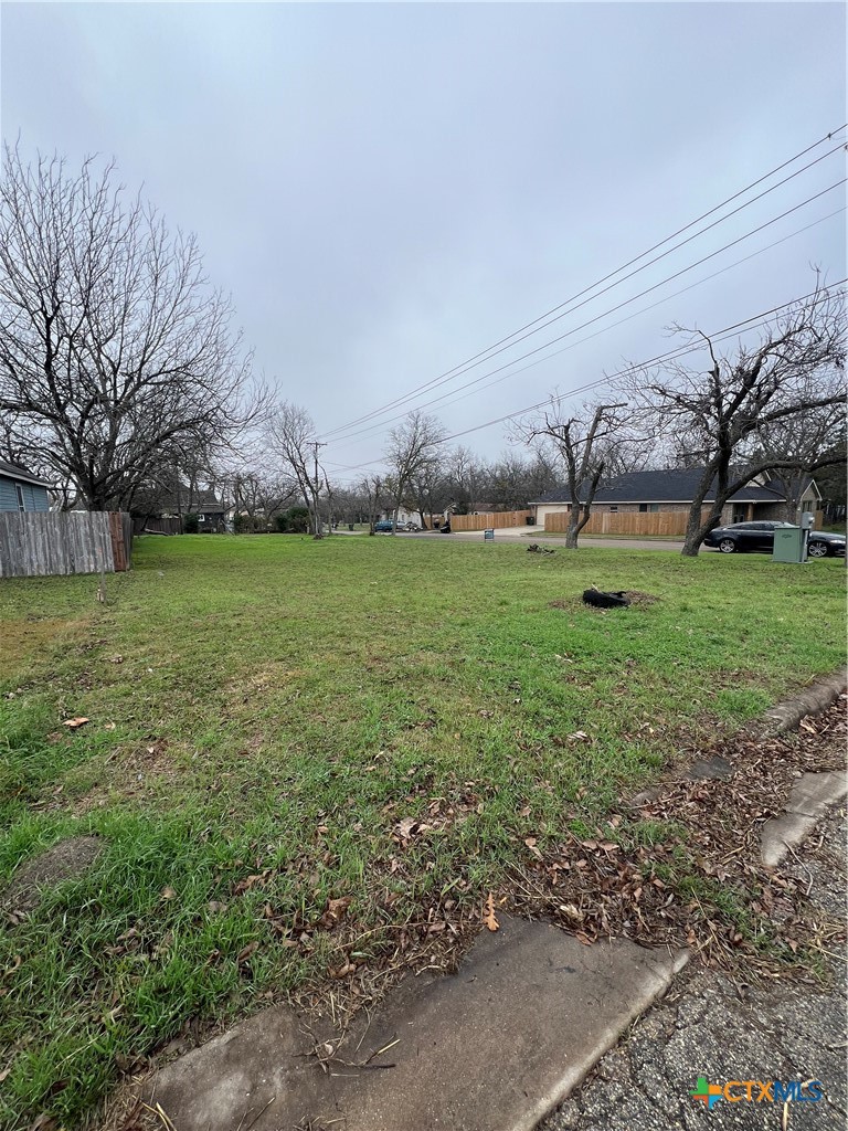 917 South 2nd Street Temple, TX 76504 - Photo 3 of 4 a view of a field with large trees