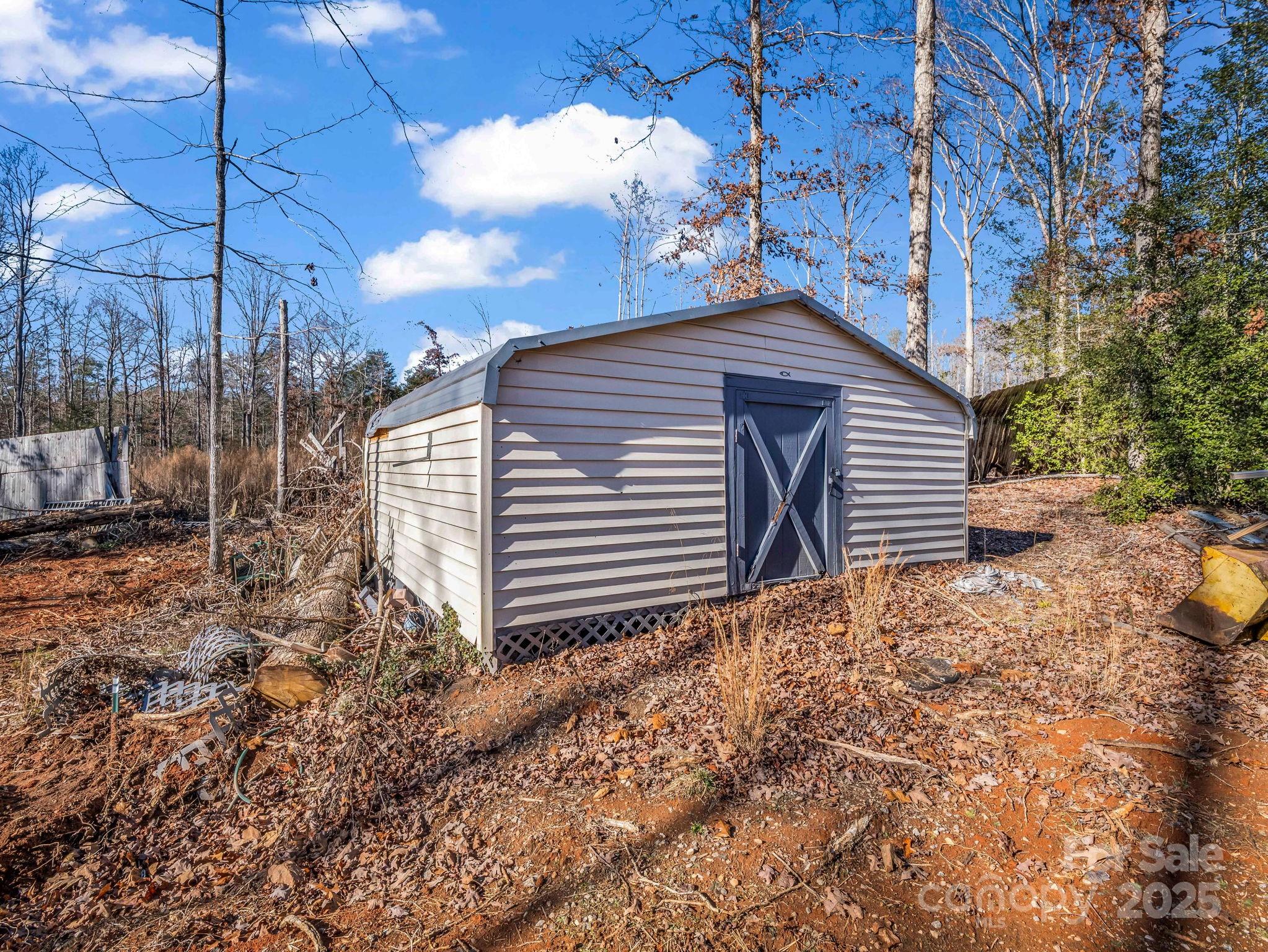 1095 Centennial Road Union Mills, NC 28167 - Photo 5 of 34 a backyard of a house with lots of green space