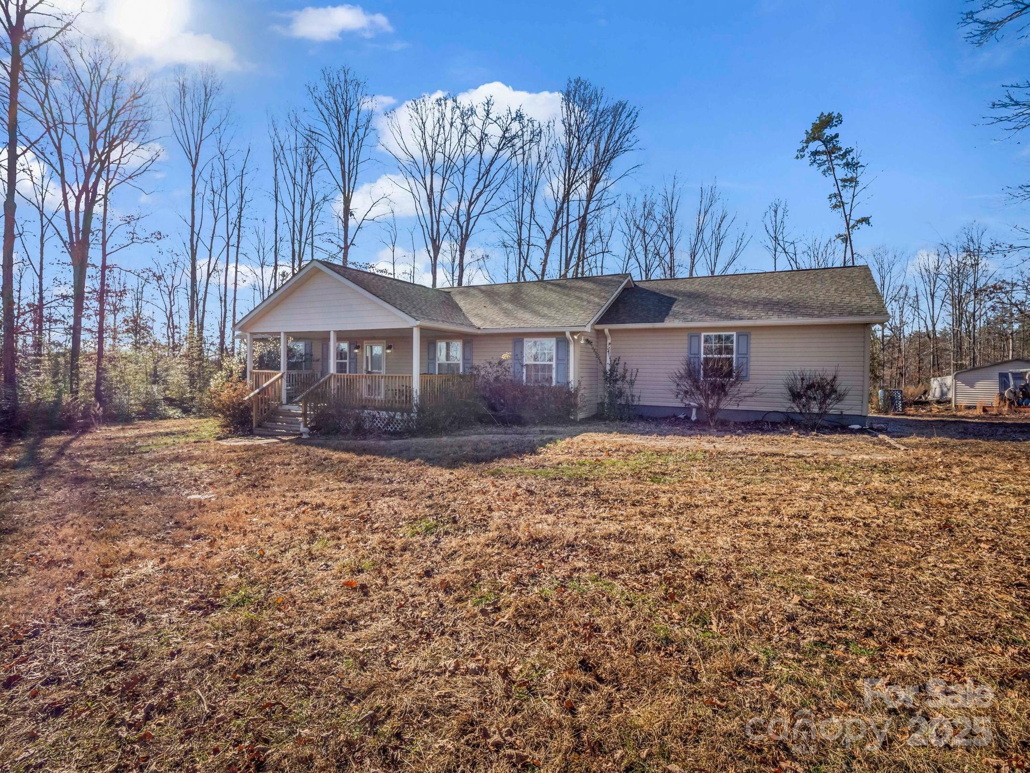 1095 Centennial Road Union Mills, NC 28167 - Photo 8 of 34 a house view with a garden space