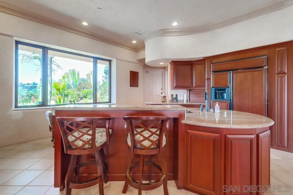 15706 Lyons Valley Road Jamul, CA 91935 - Photo 15 of 50 a dining table with chairs and window