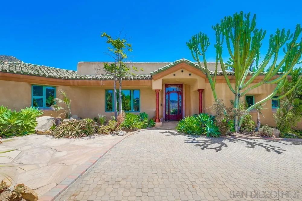 15706 Lyons Valley Road Jamul, CA 91935 - Photo 3 of 50 a front view of a house with garden