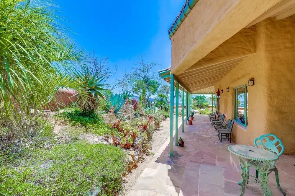 15706 Lyons Valley Road Jamul, CA 91935 - Photo 33 of 50 a view of a patio with table and chairs and potted plants