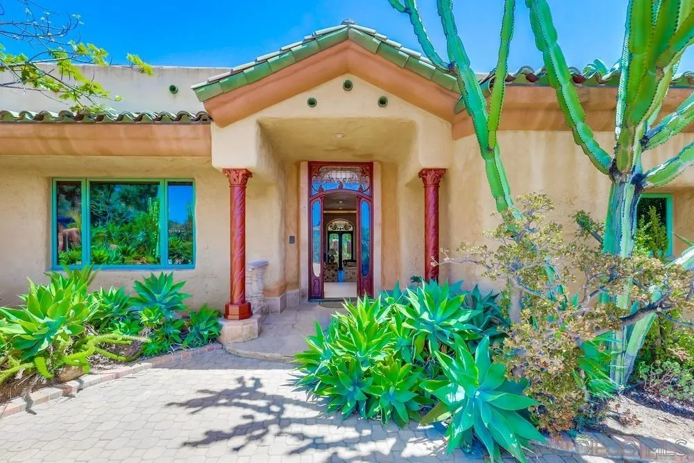 15706 Lyons Valley Road Jamul, CA 91935 - Photo 4 of 50 a front view of a house with garden