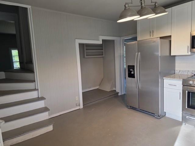 219 Grove Avenue Southeast Lindale, GA 30147 - Photo 11 of 39 a view of a refrigerator in kitchen and an empty room