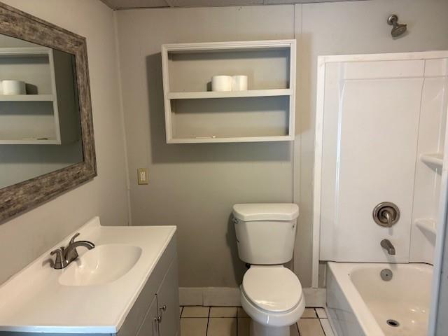 219 Grove Avenue Southeast Lindale, GA 30147 - Photo 15 of 39 a bathroom with a sink a toilet and shower