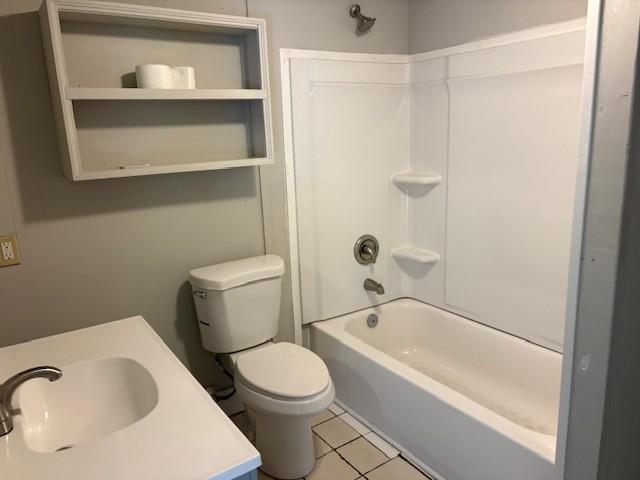 219 Grove Avenue Southeast Lindale, GA 30147 - Photo 16 of 39 a white toilet sitting next to a bath tub