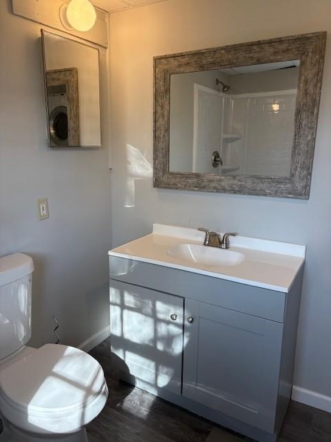 219 Grove Avenue Southeast Lindale, GA 30147 - Photo 19 of 39 a bathroom with a sink mirror and toilet