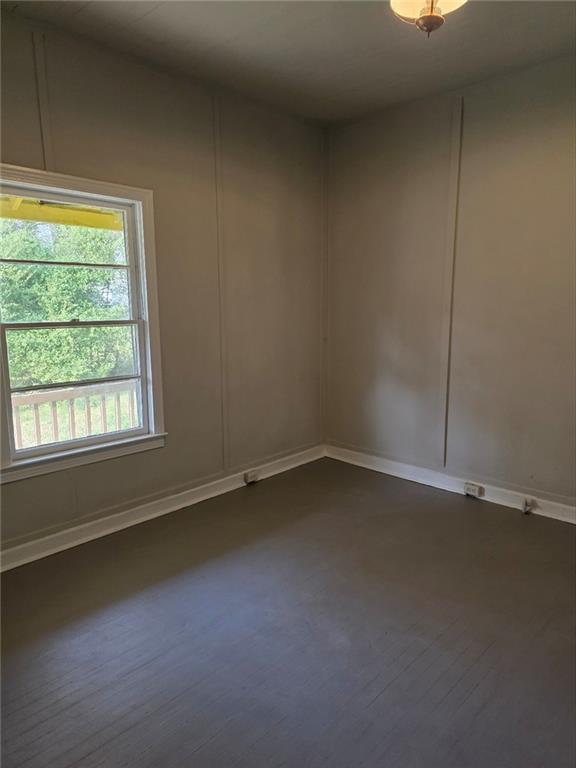 219 Grove Avenue Southeast Lindale, GA 30147 - Photo 6 of 39 an empty room with a window