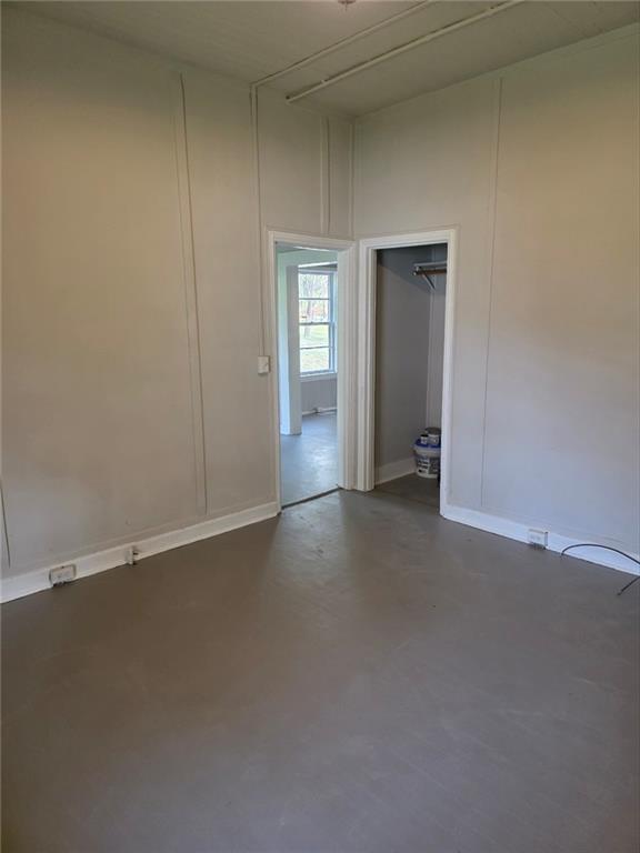219 Grove Avenue Southeast Lindale, GA 30147 - Photo 8 of 39 a view of empty room with wooden floor
