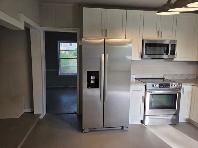 219 Grove Avenue Southeast Lindale, GA 30147 - Photo 10 of 39 a kitchen with stainless steel appliances granite countertop a refrigerator and a stove