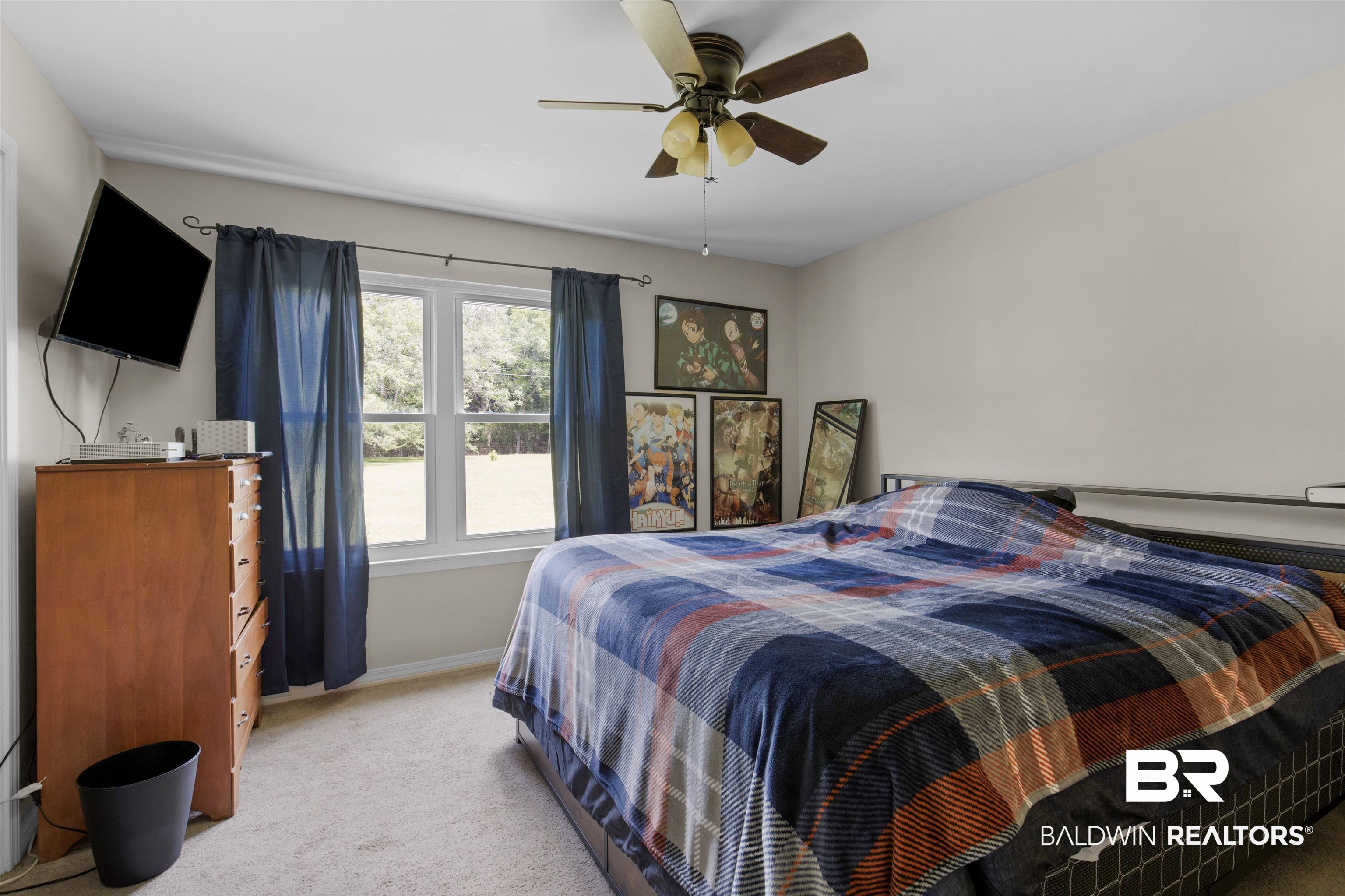 13925 Fort Lake Road Grand Bay, AL 36541 - Photo 16 of 37 Bedroom featuring light colored carpet, baseboards, and ceiling fan