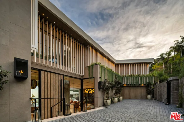 a view of a house with a street