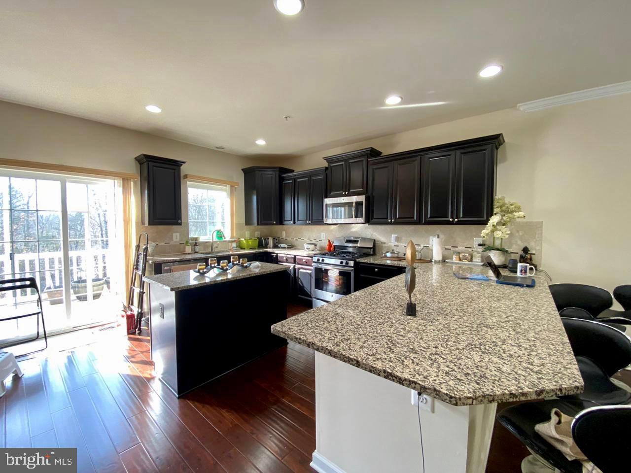 7014 Foxton Way Hanover, MD 21076 - Photo 17 of 29 Modern kitchen with elegant finishes.