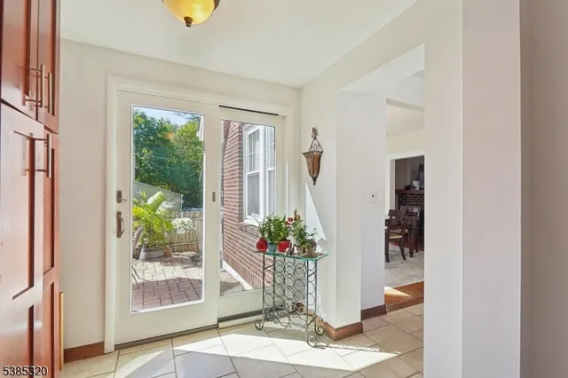 a view of a living room with a potted plant