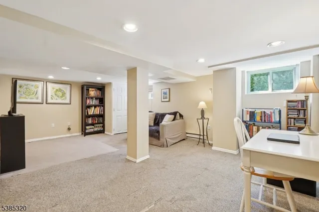 a view of a livingroom with furniture and windows