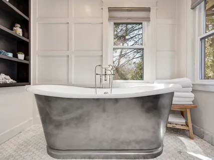 a room with a sink and a window