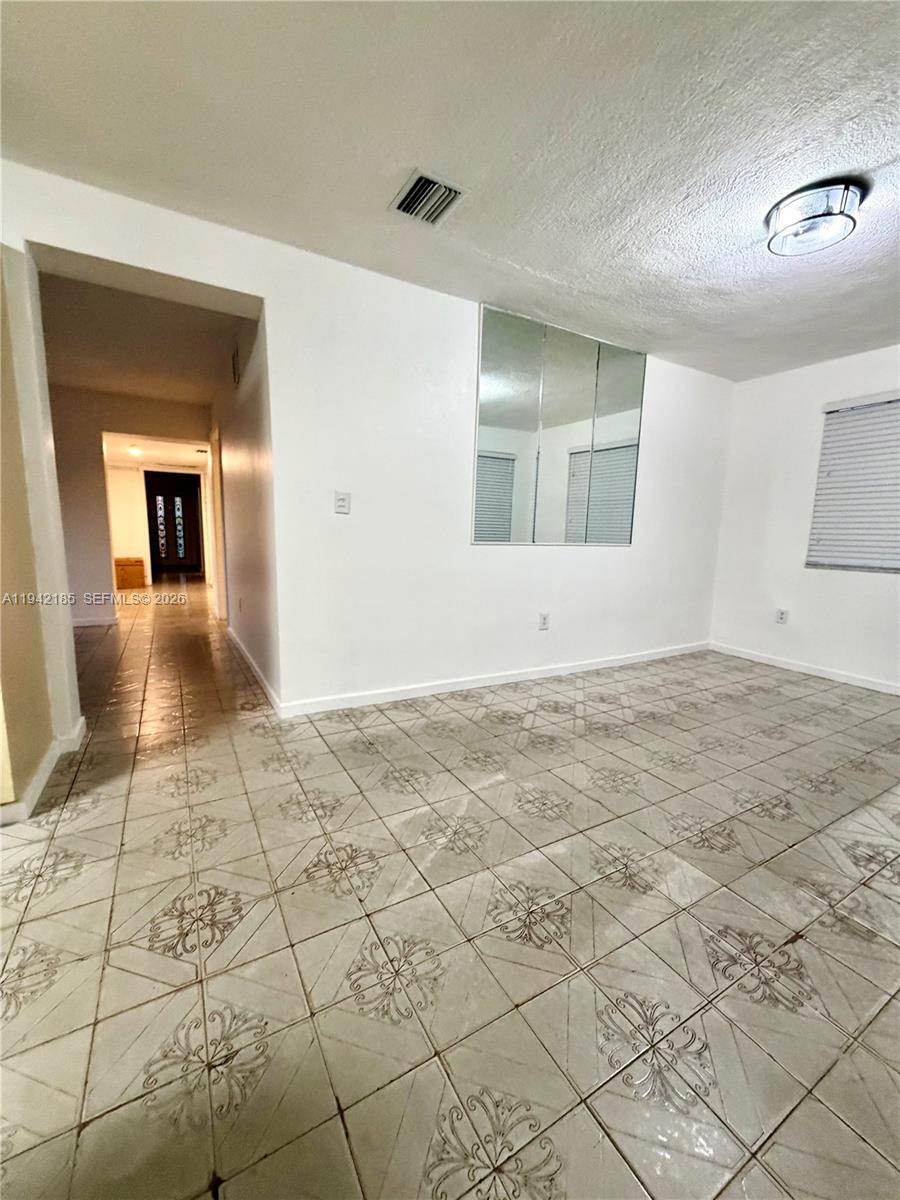 958 East 21st Street Hialeah, FL 33013 - Photo 3 of 16 a view of an empty room