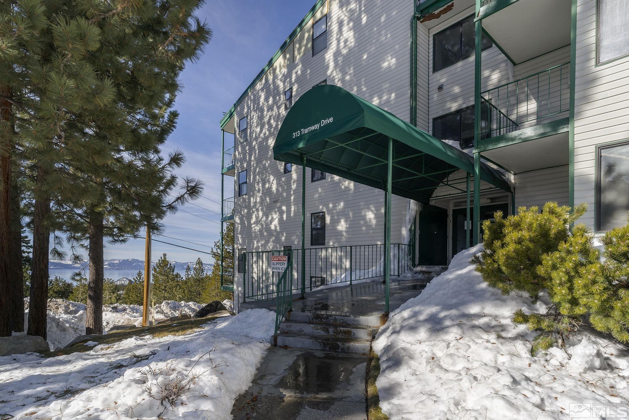 313 Tramway Drive, Unit 13 Stateline, NV 89449 - Photo 2 of 24 a view of a house with a patio