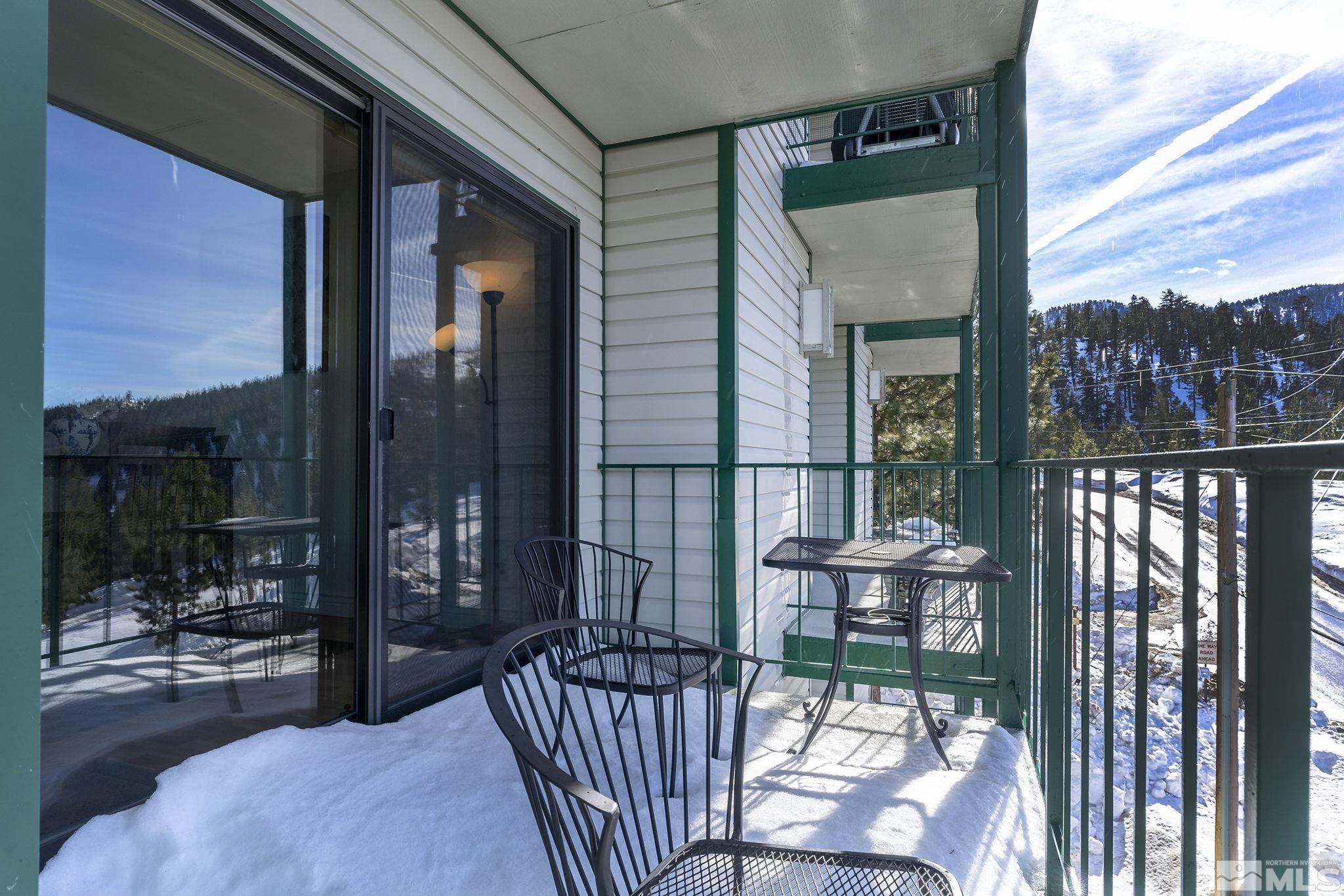 313 Tramway Drive, Unit 13 Stateline, NV 89449 - Photo 21 of 24 a view of a balcony with chair