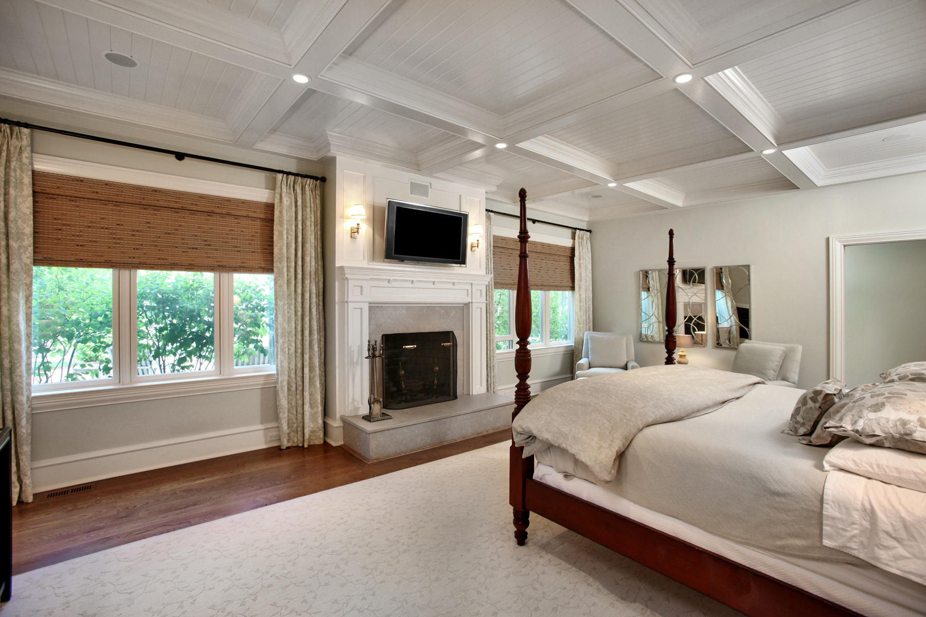 153 Chichester Road New Canaan, CT 06840 - Photo 15 of 32 a bedroom with a large bed and a fireplace