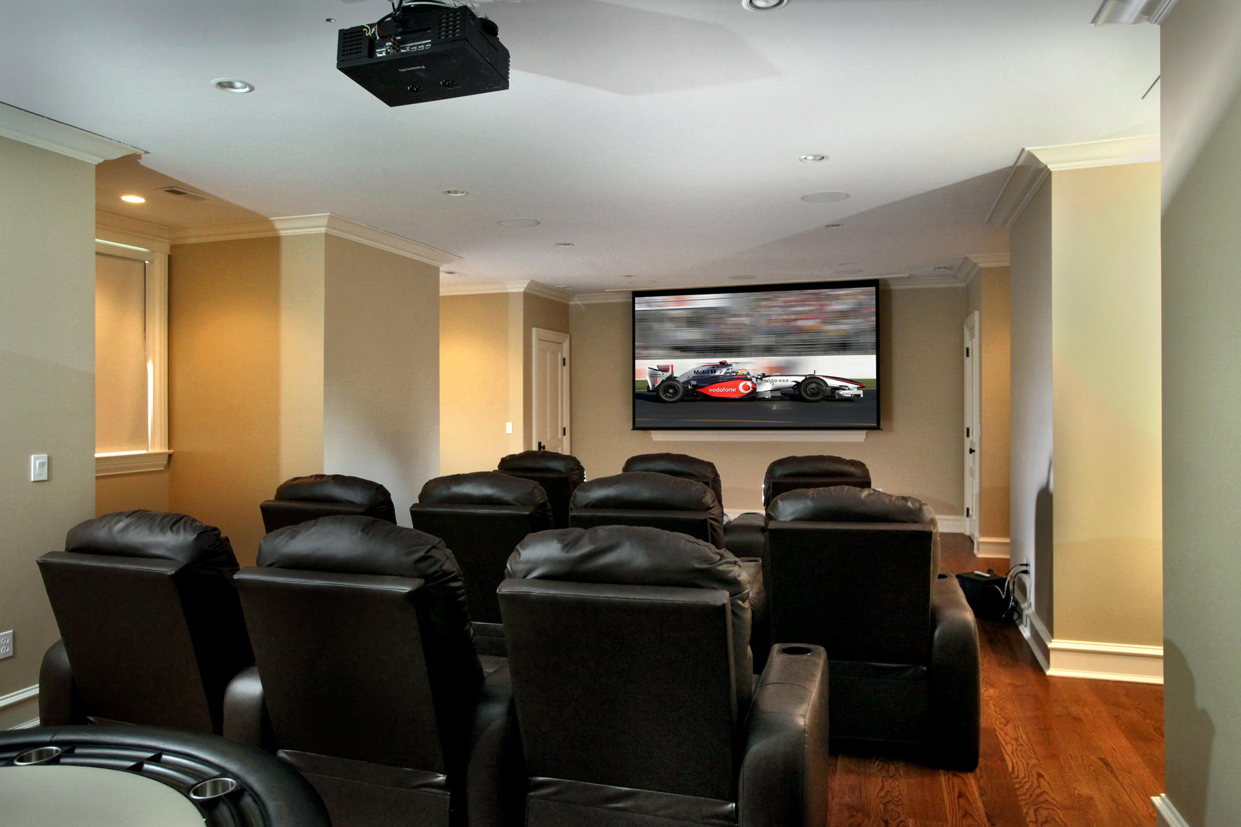 153 Chichester Road New Canaan, CT 06840 - Photo 23 of 32 a room with furniture projector and screen