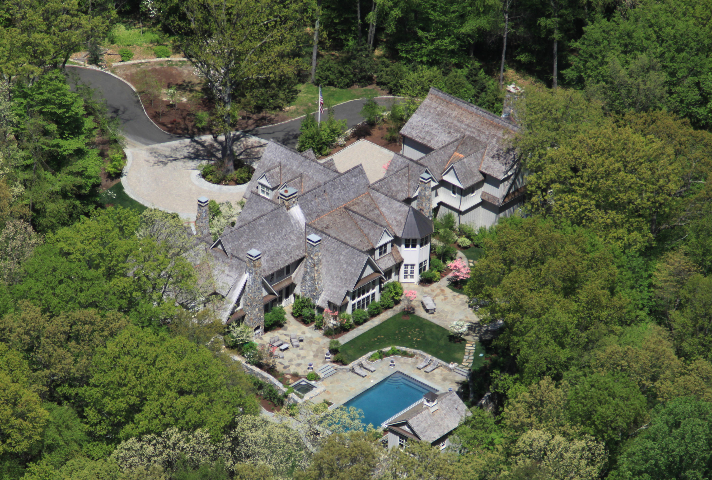 153 Chichester Road New Canaan, CT 06840 - Photo 26 of 32 an aerial view of multiple houses with yard