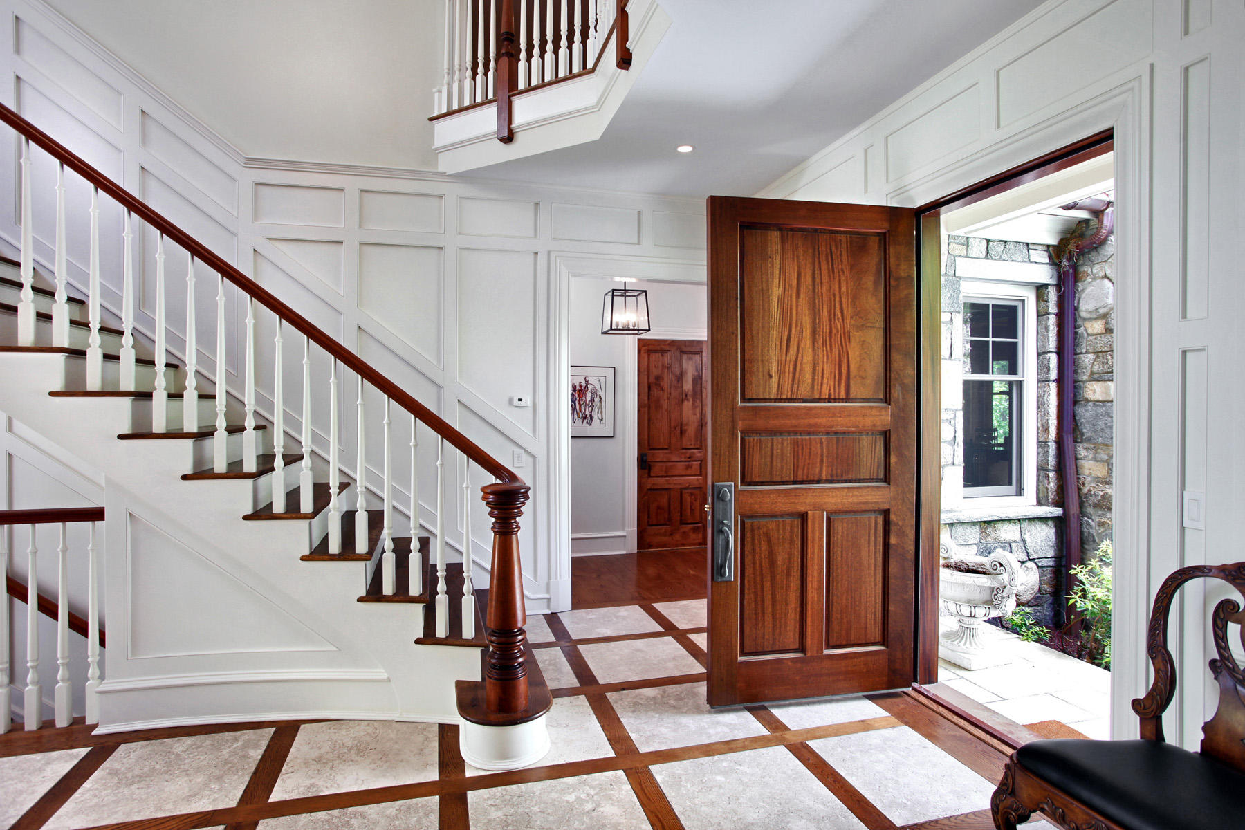 153 Chichester Road New Canaan, CT 06840 - Photo 4 of 32 a view of entryway with wooden floor and livingroom view