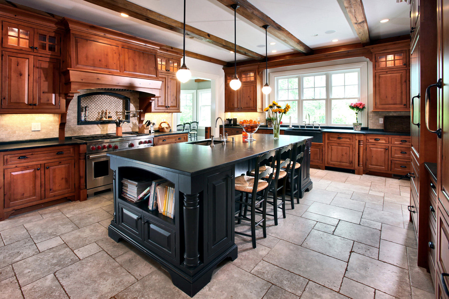 153 Chichester Road New Canaan, CT 06840 - Photo 9 of 32 a kitchen with stainless steel appliances granite countertop a stove a sink and a microwave