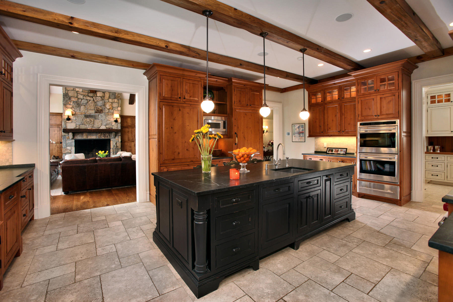 153 Chichester Road New Canaan, CT 06840 - Photo 10 of 32 a kitchen with stainless steel appliances granite countertop a stove a sink and a refrigerator