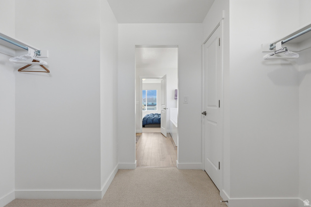 1353 Mapleton Hts Court Mapleton, UT 84664 - Photo 24 of 50 View 2 Primary Suite WIC with Linnen closet featuring light colored carpet and baseboards