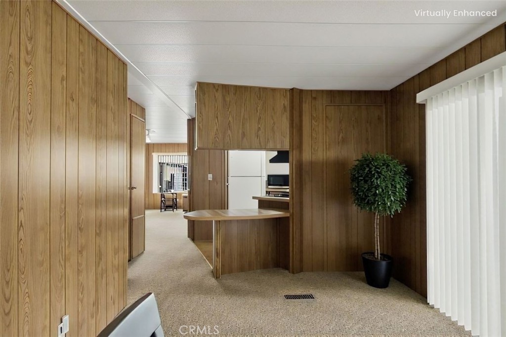 12367 4th Street Yucaipa, CA 92399 - Photo 7 of 19 a room with furniture and a potted plant