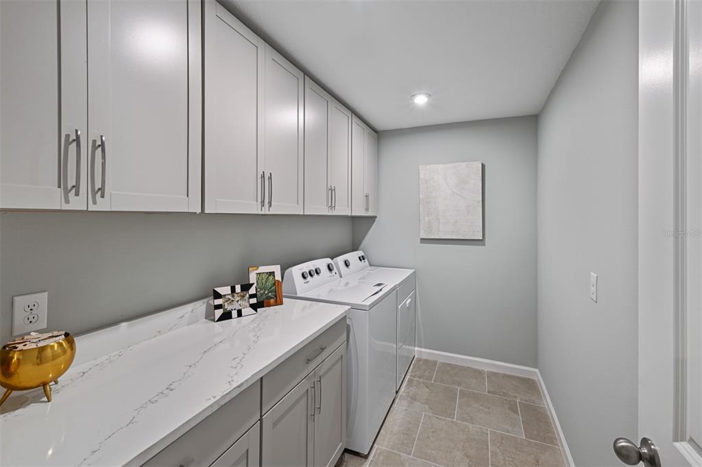 3358 Timber Xing Avenue Brandon, FL 33511 - Photo 12 of 22 a room with storage and utility
