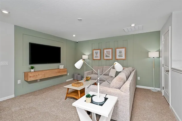a bathroom with a shower sink and mirror