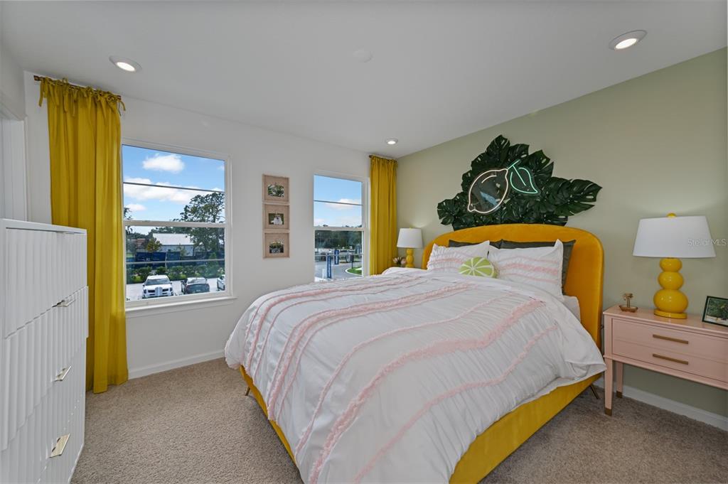 3358 Timber Xing Avenue Brandon, FL 33511 - Photo 17 of 22 a bedroom with a bed and wooden floor