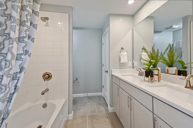 a view of a porch with furniture and garden