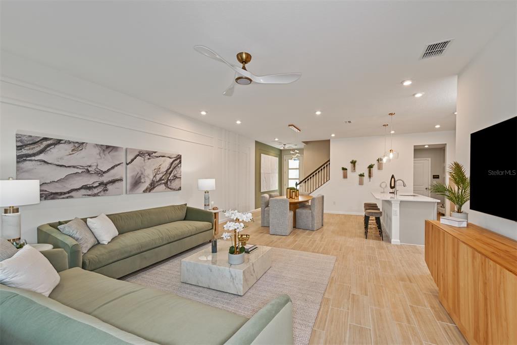 3358 Timber Xing Avenue Brandon, FL 33511 - Photo 8 of 22 a living room with furniture and a flat screen tv