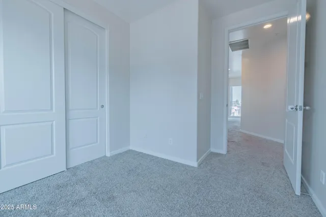 an empty room that has a window