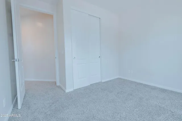 a utility room with sink dryer and washer