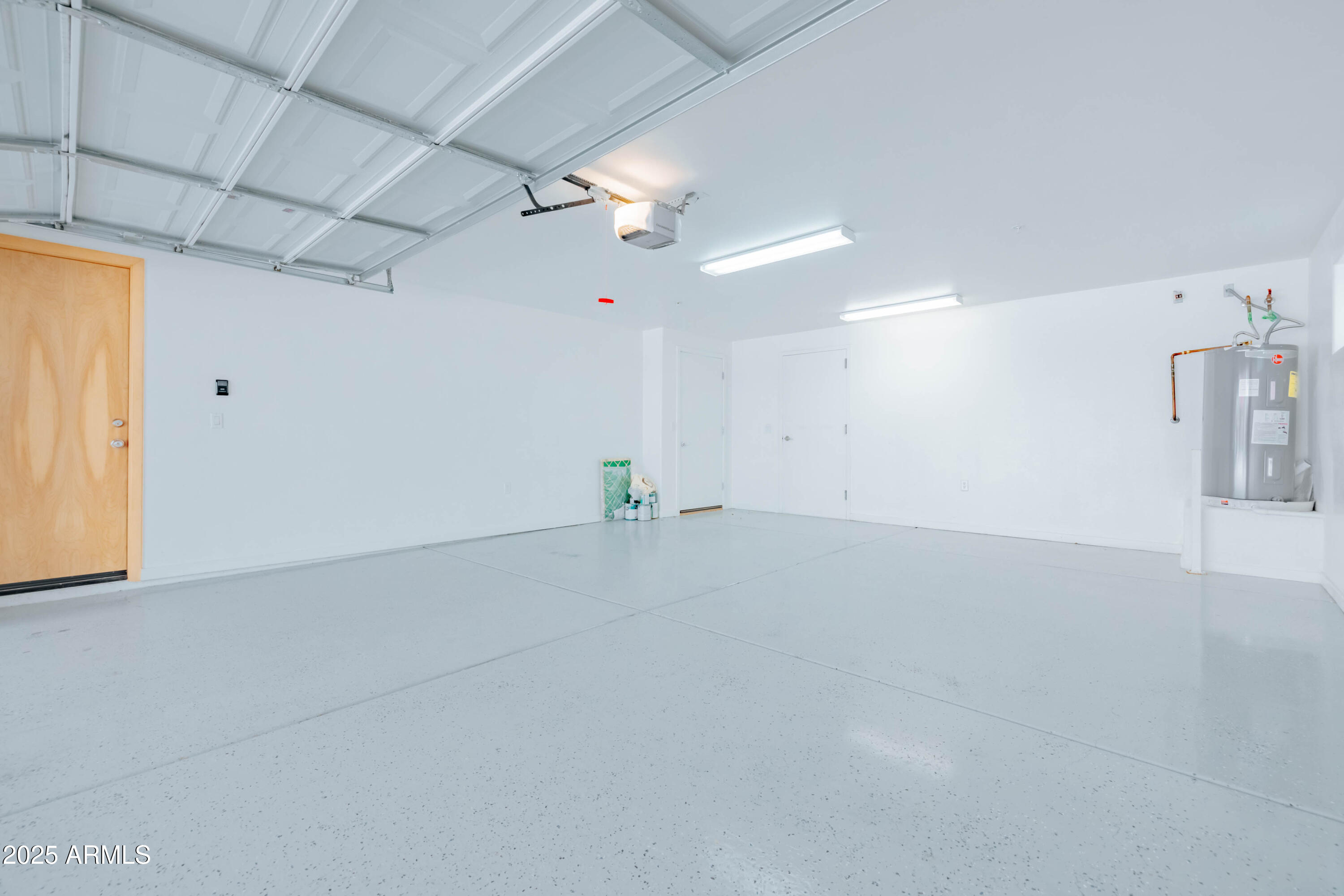 4739 East Culver Street Phoenix, AZ 85008 - Photo 41 of 55 an empty room with chandelier fan and windows