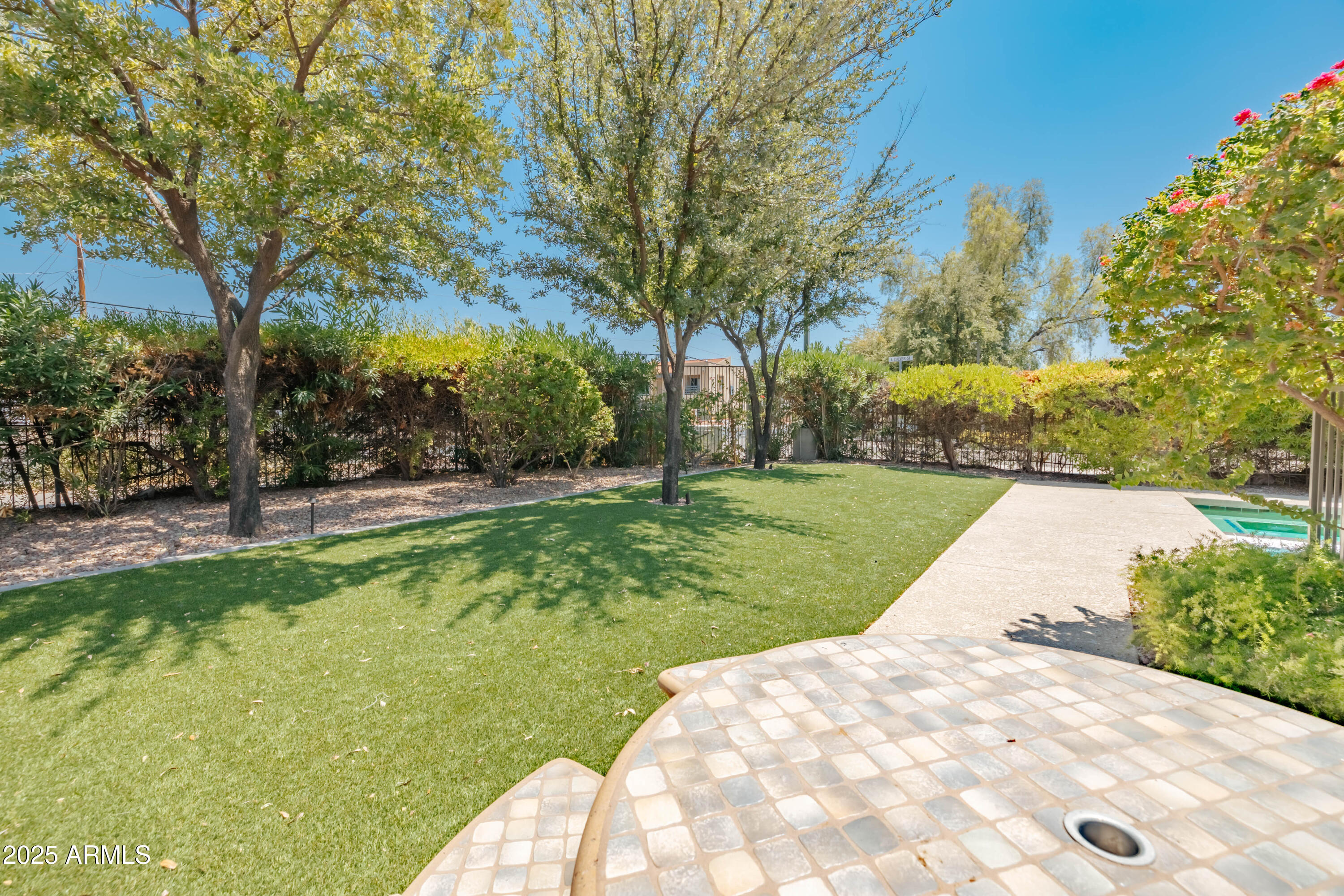 4739 East Culver Street Phoenix, AZ 85008 - Photo 50 of 55 a view of a garden with a fountain