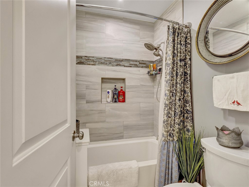 1200 West Lambert Road, Unit 44 La Habra, CA 90631 - Photo 13 of 33 a bathroom with a shower a toilet and a sink