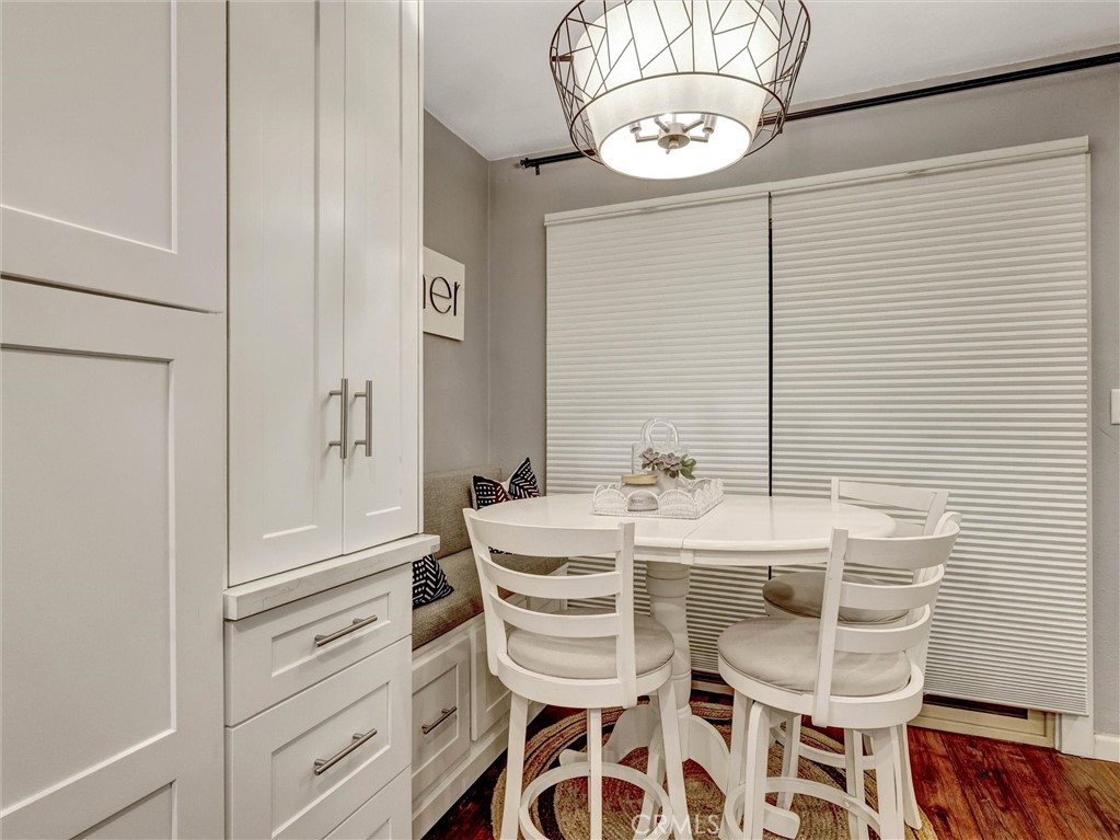 1200 West Lambert Road, Unit 44 La Habra, CA 90631 - Photo 20 of 33 a view of a dining room with furniture and wooden floor