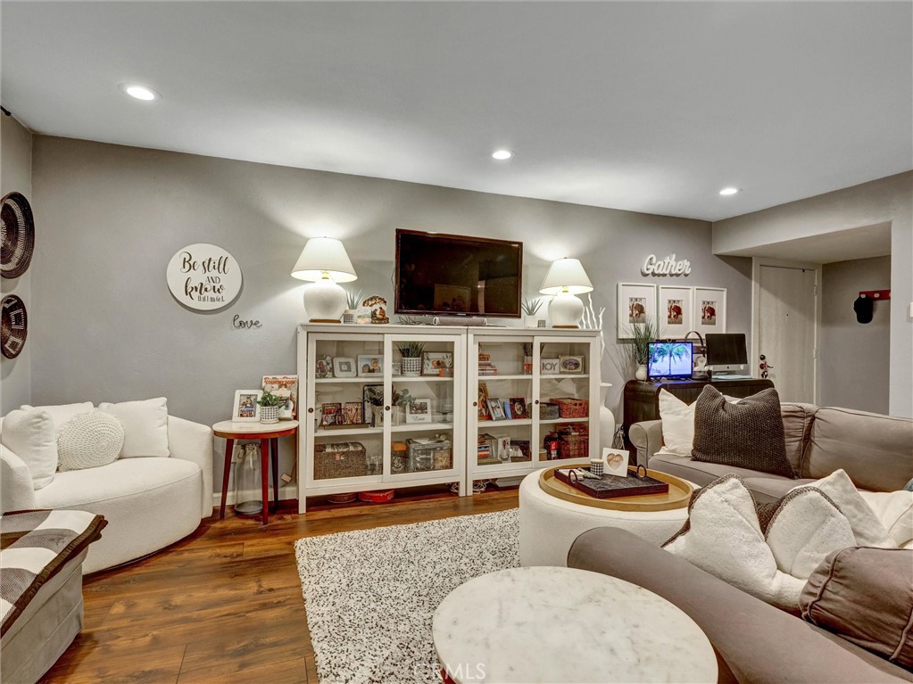 1200 West Lambert Road, Unit 44 La Habra, CA 90631 - Photo 22 of 33 a living room with furniture and a flat screen tv