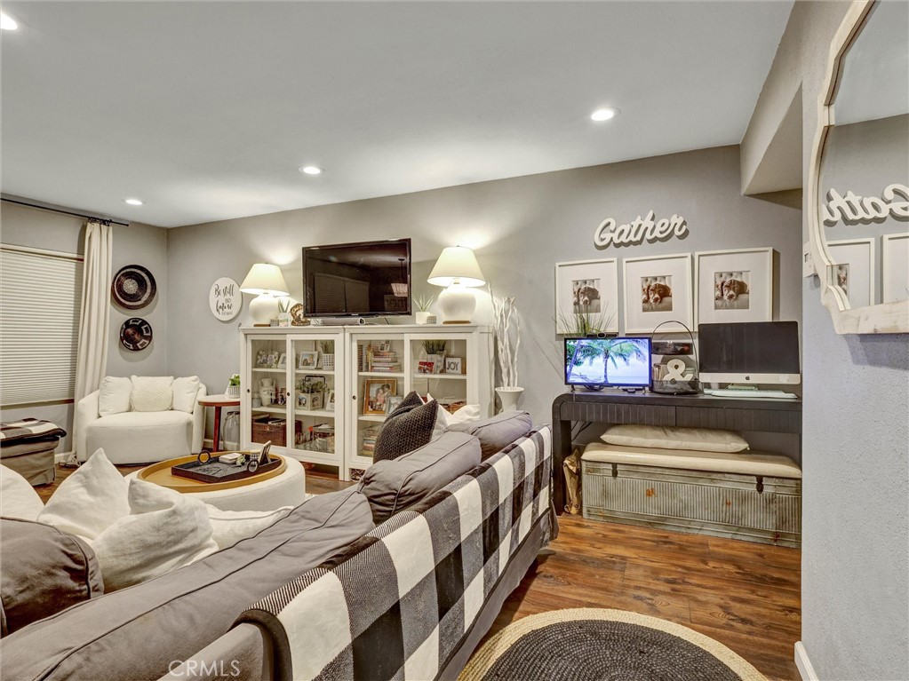 1200 West Lambert Road, Unit 44 La Habra, CA 90631 - Photo 27 of 33 a living room with furniture and a flat screen tv