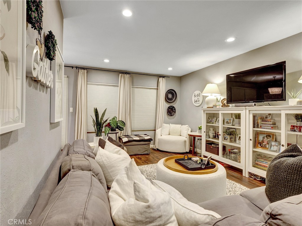 1200 West Lambert Road, Unit 44 La Habra, CA 90631 - Photo 28 of 33 a living room with furniture and a flat screen tv