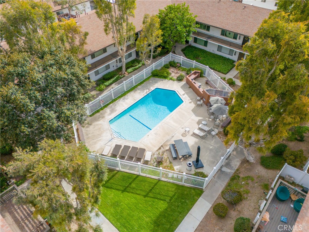 1200 West Lambert Road, Unit 44 La Habra, CA 90631 - Photo 31 of 33 an aerial view of a house with a garden and swimming pool